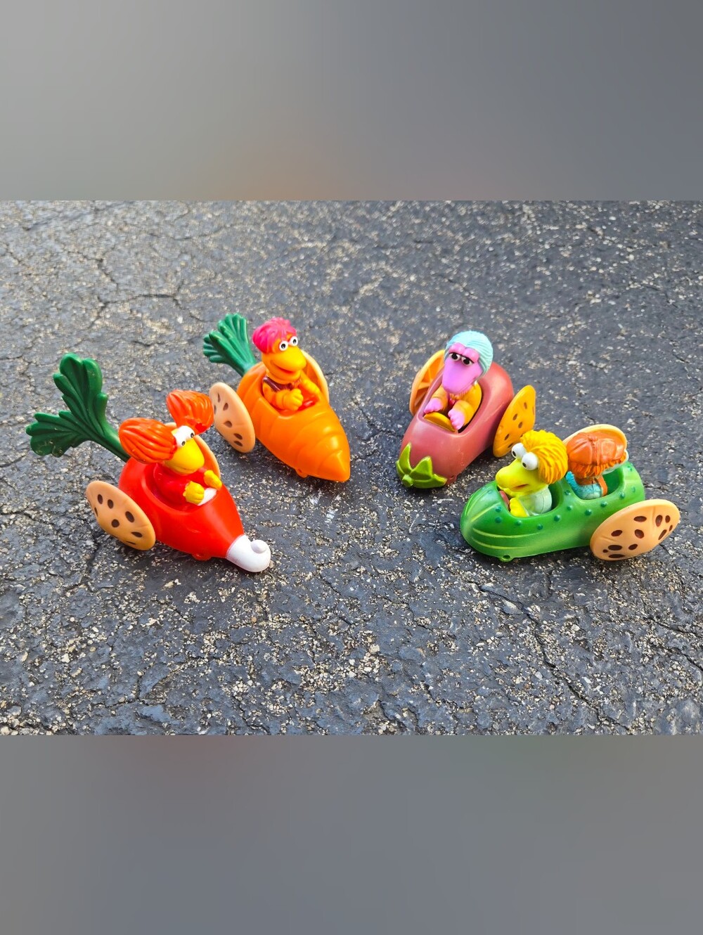 Fraggle Rock Racer Toy Figures - Orange, Red, Green, Pink
